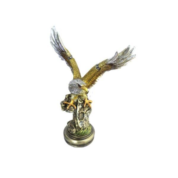 Escultura Águia Dourada em Ataque Sobre Tronco